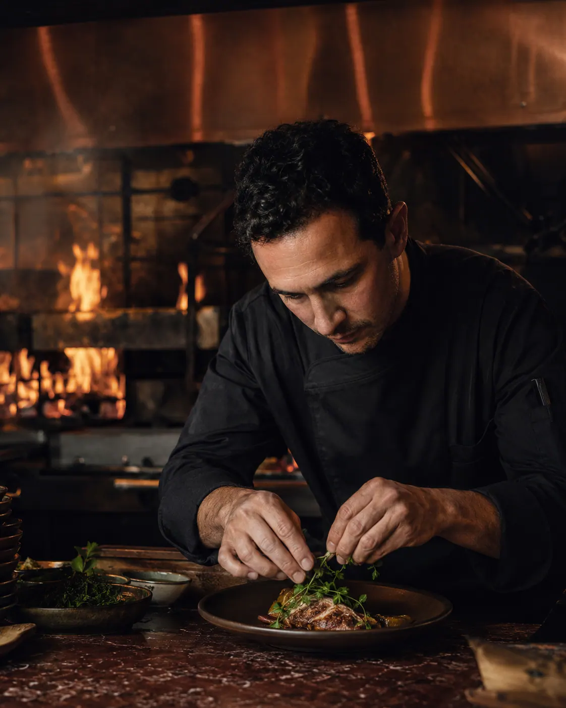 Chef working at the live fire