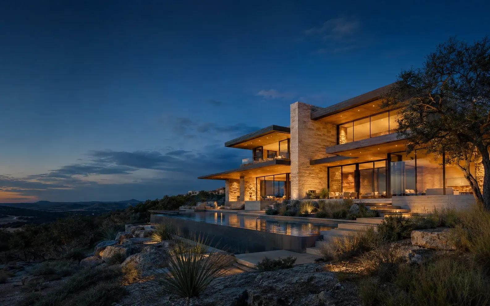 Modern Hill Country estate at twilight